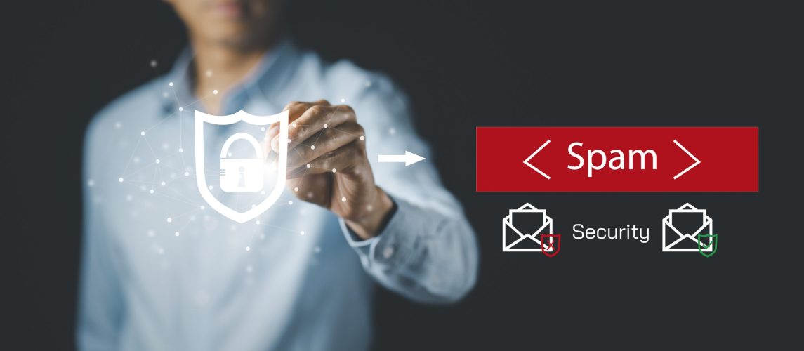 Email concept with laptop spam and virus computer monitor internet security concept, Businessman touch key security icon mail, Spam, junk and e-marketing on screen, Spam Email Pop-up Warning